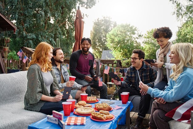 medium-shot-family-celebrating-4th-july-outdoors_23-2149383080